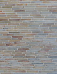 background of a wall of colored decorative bricks