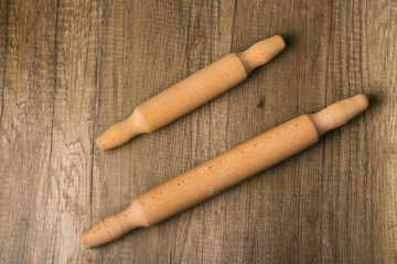 two rolling pins lie on the table