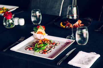 Fresh octopus carpacio with citrus spinach salad pesto balsamic dressing