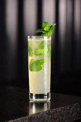 Mojito glass on dark background