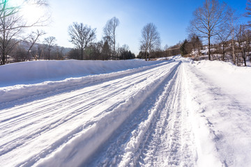 Fototapeta na wymiar empty snow road