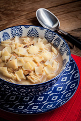 Mushroom soup with noodles.