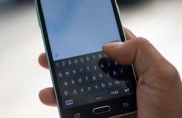 smart phon and hand  touch on keypad