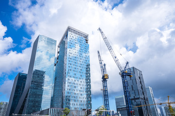 Fototapeta premium up view of modern office building in hongkong china