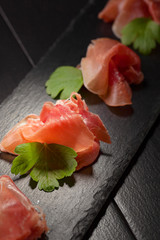 Jamon serrano with parsley .