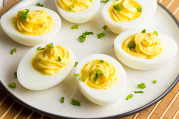 Stuffed eggs, yellow mousse, wine snack, holiday party