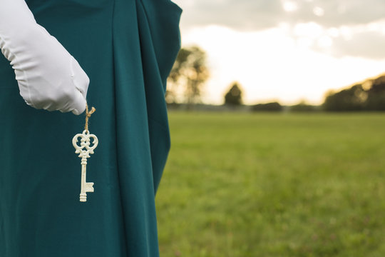 Woman holding key