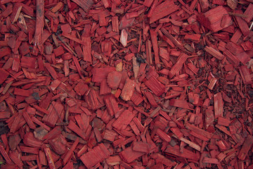 Red wood chips texture, wooden decorative background