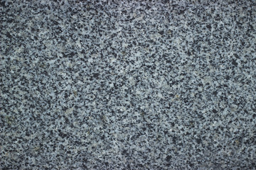 Stone pavement texture. Granite cobblestoned background.
