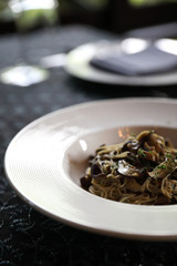 Spaghetti truffle cream sauce with mushroom