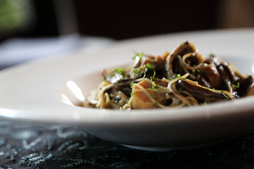 Spaghetti truffle cream sauce with mushroom