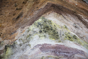 Jigokudani or Hell Valley in the town of Noboribetsu Onsen, hot steam vents, sulfurous streams and other volcanic activity, hot spring waters, Hokkaido, Japan, traveling concept.