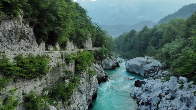 Flying backward over wild river Soca,Slovenia