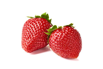 Two ripe strawberries on white