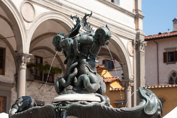Fototapeta na wymiar Pietro Tacca bronze fountain, sculptor. Square of the Santissima Annunziata in Florence (Italy).