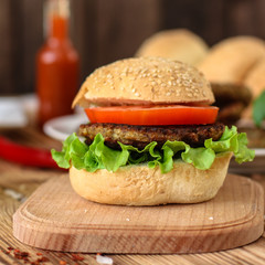 burgers on a slate plate and frothy beverage  - fast food (sandwich) - cuisine.  Food background