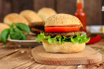 burgers on a slate plate and frothy beverage  - fast food (sandwich) - cuisine.  Food background