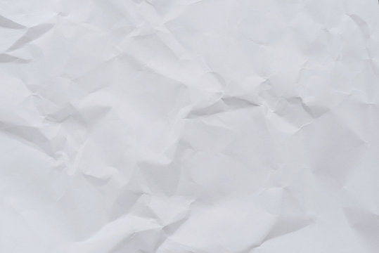 Abstract white crumpled paper background