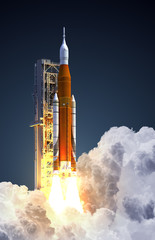 Space Launch System Takes Off On Blue Background