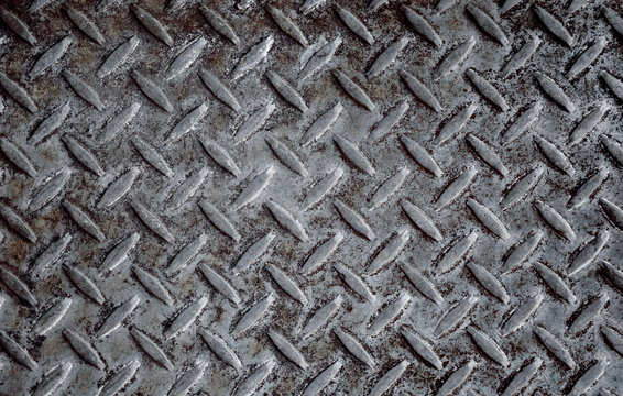 Large Seamless Sheet Of Steel Aluminum Or Nickel Tread Plate. Dirty Grunge Background Pattern With Dirt And Grime. Worn Piece Of Metal.