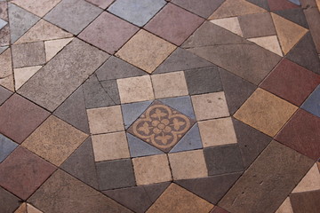 detail of a beautiful old tiled floor with geometric patterns