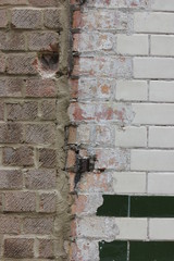 a degraded brick wall