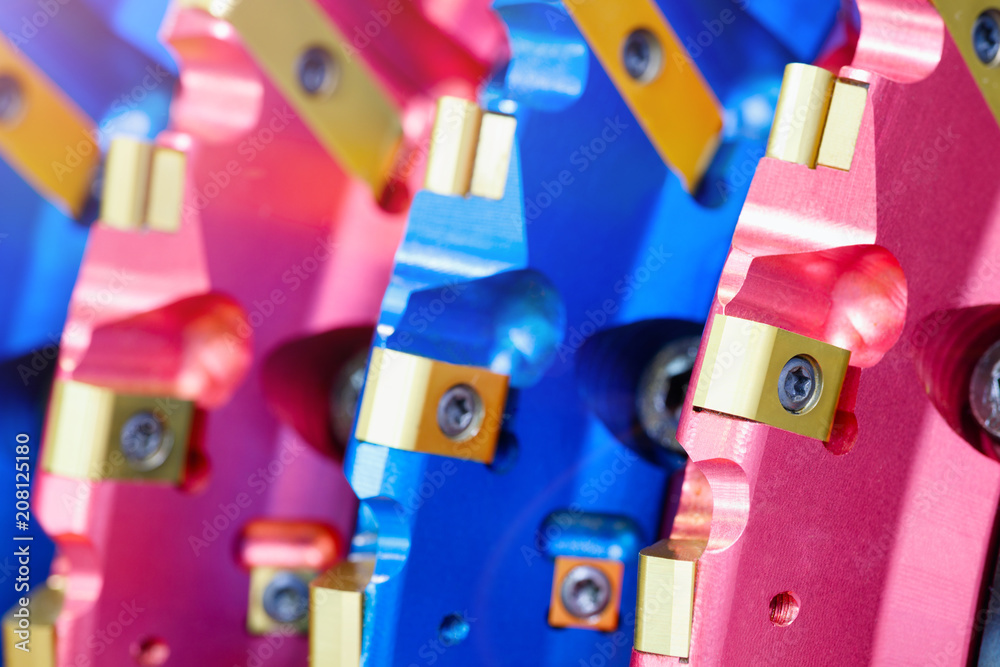 Aufkleber close up view on brand new drill bit roller cutter for drilling machines and equipment for oil and g