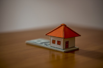 Obraz na płótnie Canvas Model house with your deposit money