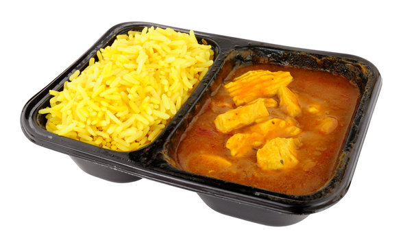 Chicken curry and rice microwave convenience meal isolated on a white background