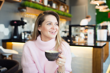 beautiful girl in cafe smiling