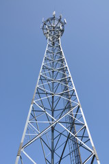 Communication tower with blue sky background