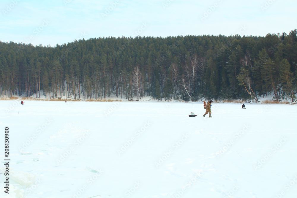 Wall mural fishermen on the city's frozen pond. winter fishing. russia, february, 2018.