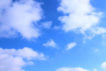 Beautiful blue sky and white cumulus clouds. Background. Landscape.