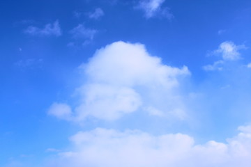 Beautiful blue sky and white cumulus clouds. Background. Landscape.