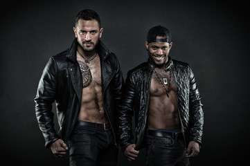 Masculinity and brutality concept. Men on smiling faces with bristle. Machos with muscular torsos...