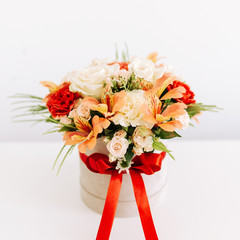 Beautiful bouquet of fresh and colorful flowers on isolated white background.