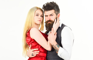 Woman in red dress and man in vest. Dancing couple concept. Bearded hipster and attractive lady...