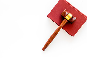 Law student concept. Judge gavel and vintage books on white background top view copy space