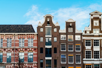 Beautiful Architecture Of Dutch Houses On Amsterdam Canal In Autumn
