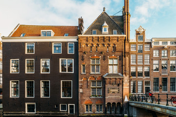 Beautiful Architecture Of Dutch Houses On Amsterdam Canal In Autumn