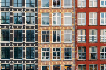 Beautiful Architecture Of Dutch Houses On Amsterdam Canal In Autumn