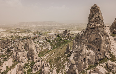 Fototapeta na wymiar Aerial view of Ortahisar caves in Capapdocia