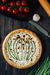 Beautiful asparagus tart - fresh pie with asparagus and goat cheese