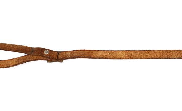 Old, brown leather belt, strap isolated on white background