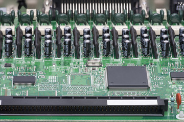 Electronic components are mounted on the device board Chips diodes capacitors chokes Close-up