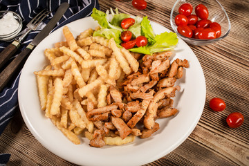 Greek gyros dis with fries and salad