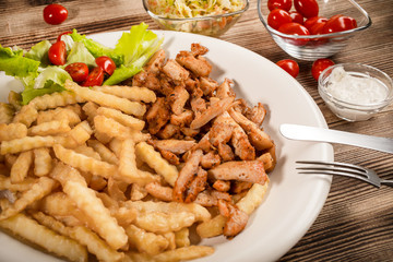 Greek gyros dis with fries and salad