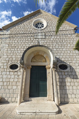 Fototapeta na wymiar Front door of the Franiscan Monestary in Cavtat, Croatia.