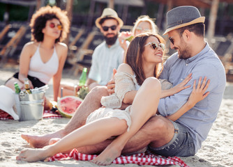 Happy young couple on the beach