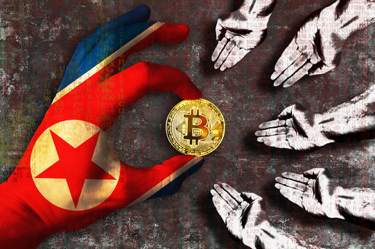 Bitcoin cryptocurrency North Korea flag Golden Coin of Bitcoin in the Northern Korean flag hand giving coin in to hands of poor people Grunge background with binary code of matrix effect